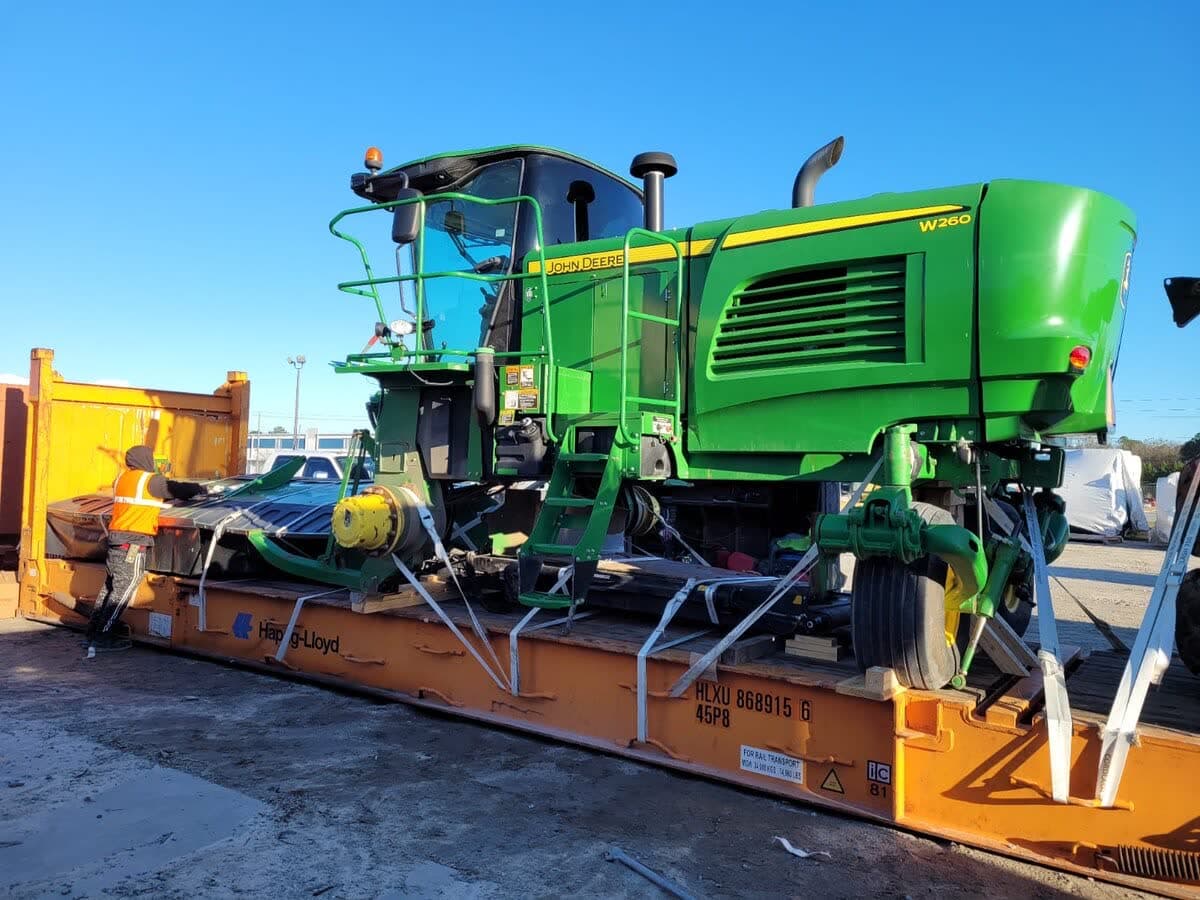 Segadora autopropulsada John Deere W260 comprada en subasta para exportación