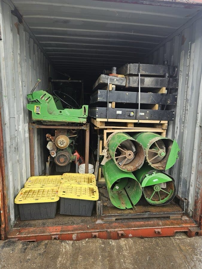 Spare parts bagged, tagged, and blocked inside a 40ft container